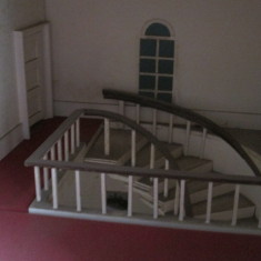 upper floor Sarah Rendall's dolls' house Meticulously curved banisters