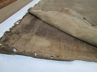 Close-up of back of one of the Knole Cartoons during conservation off site in 2016