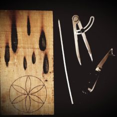 Taper burn marks and daisywheel ritual protection marks Rase knife (bottom right), a carpenter's tool used to make ritual protection marks
