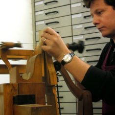 Yannick Chastang closeup Yannick cutting Boulle marquetry on a marquetry donkey | Thibaut Degenne