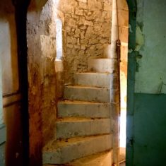 The stone spiral stairs up to Eddy's Music Room